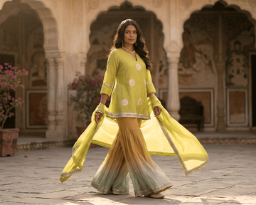 Woman in a traditional outfit walking in an architectural setting